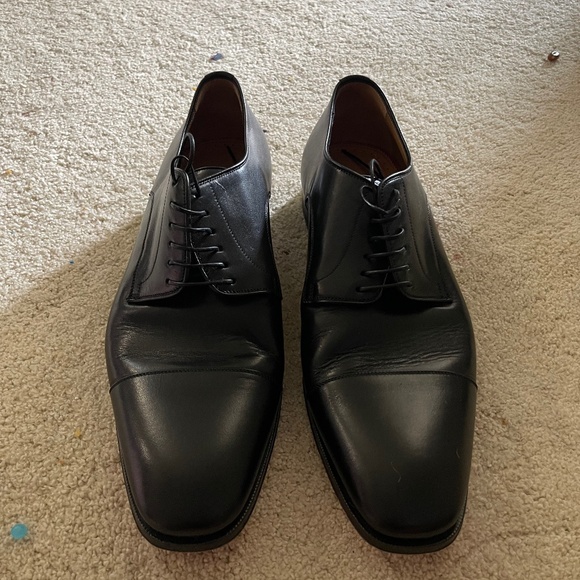 Christian Louboutins pristine red bottom men’s shoes